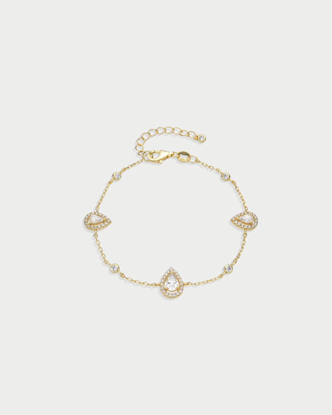 Bracelet Trio Infini Poire doré en argent 925 rhodié à l’or fin avec trois pierres en zirconium blanc taille poire disposées le long d’une chaîne fine ajustable, bijou élégant et lumineux