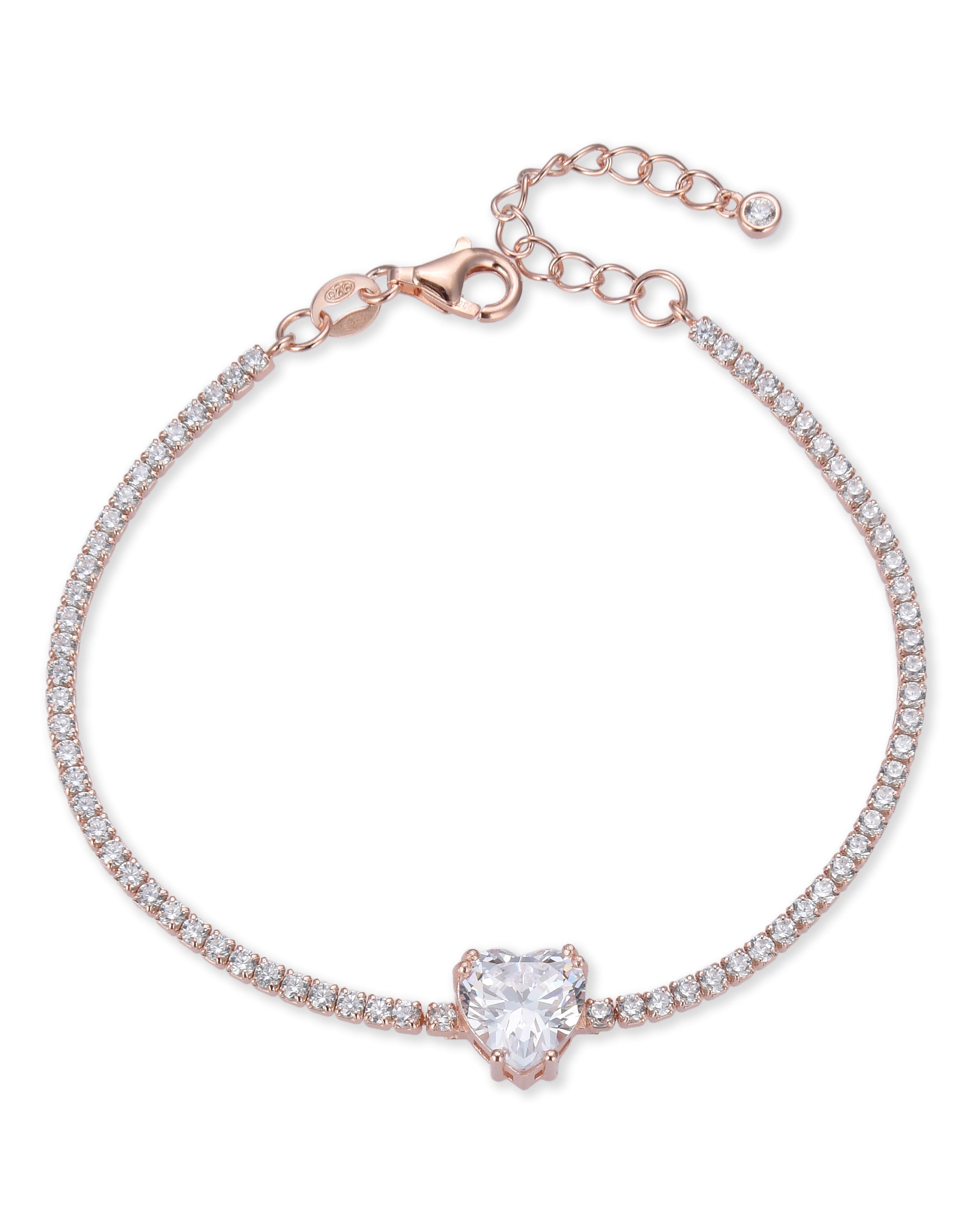 Bracelet « Tennis Cœur » en argent 925 doré à l'or 18 carats doré, rangée continue de pierres blanches sublimée par un cœur de zirconium.