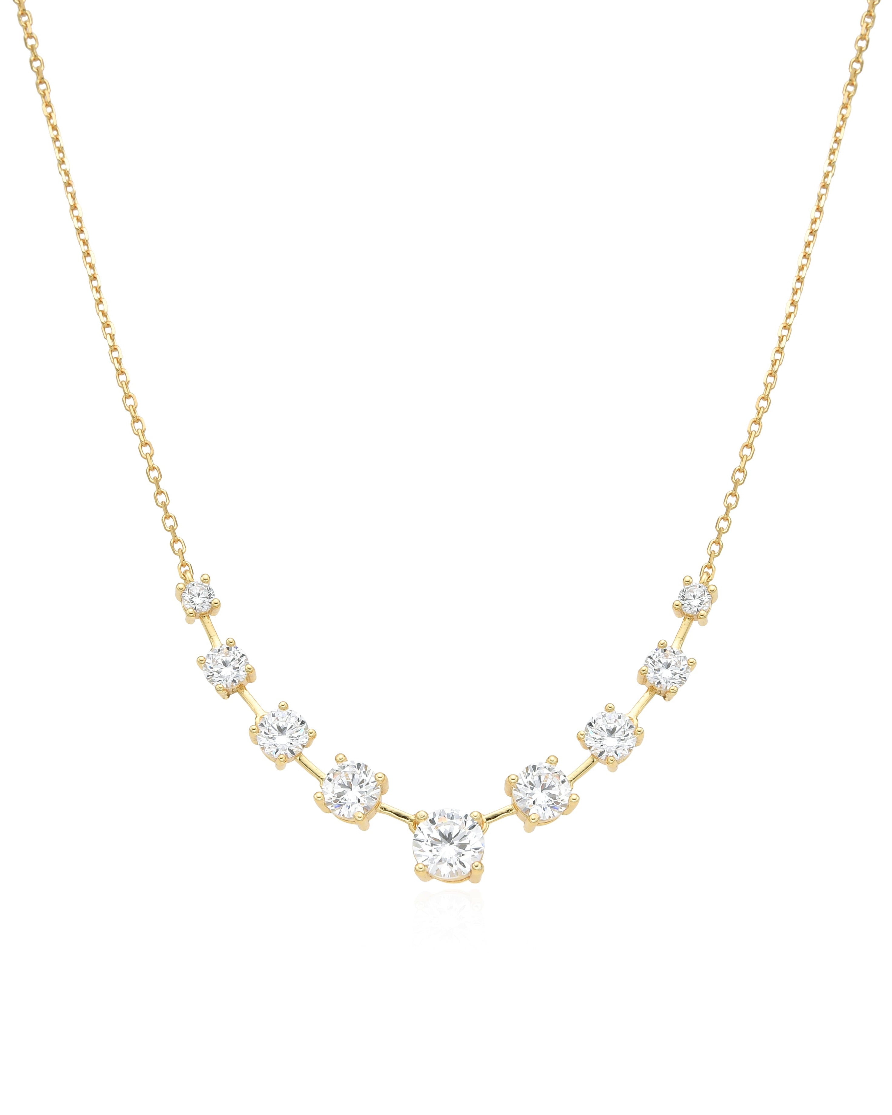 Bracelet « My Glow » en argent 925 doré à l'or jaune 18 carats, orné de plusieurs pierres blanches facettées de différentes tailles, montées sur une chaîne fine, finition polie brillante.