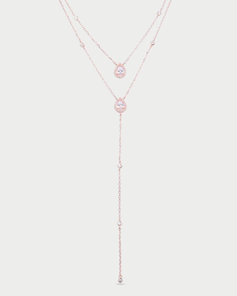 Sautoir « Double Infini Poire » en argent 925 doré à l’or rose 18 carats, double rang dont un rang choker orné de pierres en zirconium taille poire, finition polie brillante.