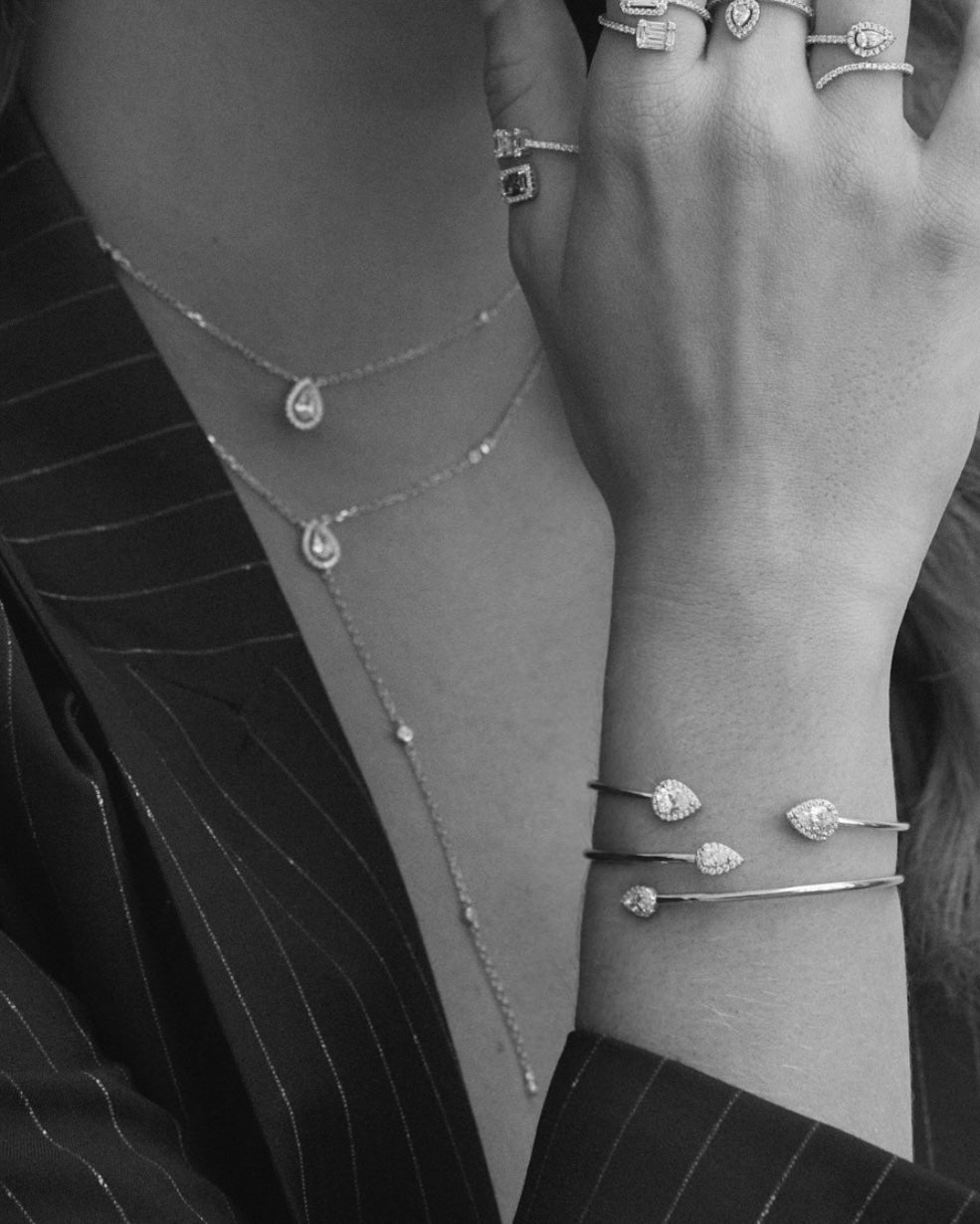 Sautoir « Double Infini Poire » en argent 925 doré à l’or rose 18 carats, double rang dont un rang choker orné de pierres en zirconium taille poire, finition polie brillante.