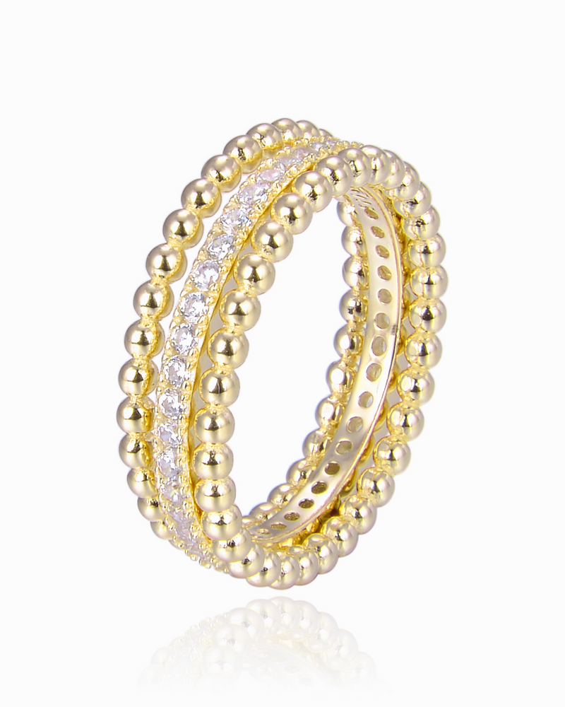 Bague « Trois Rangs Intemporel » en argent 925 doré à l'or 18 carats, design composé de trois anneaux parallèles 2 à boules lisses et 1 serti finition polie brillante.