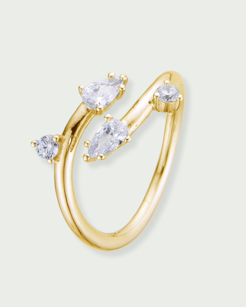 Bague lisse argent 925 doré à l'or 18 carats jaune et zirconiums tailles poire et brillants façon branches subtiles