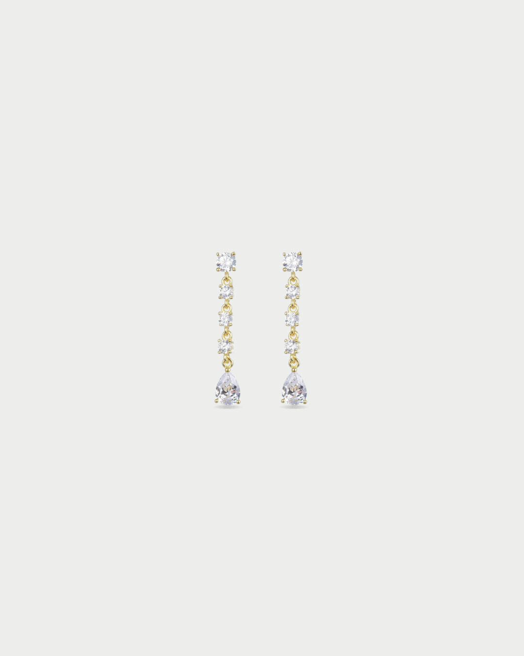 Boucles d’oreilles pendantes Shine Éclat dorées en argent 925 doré à l’or 18 carats avec cascade de pierres en zirconium rondes et poire scintillantes, design délicat et lumineux pour sublimer le visage avec élégance.
