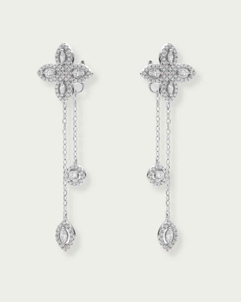 Boucles d’oreilles « Doubles Pendantes Fleur de Vie » en argent 925 rhodié, design pendulaire avec deux motifs floraux « Fleur de Vie » ornés de zirconiums taille marquise et ronde, finition polie brillante.