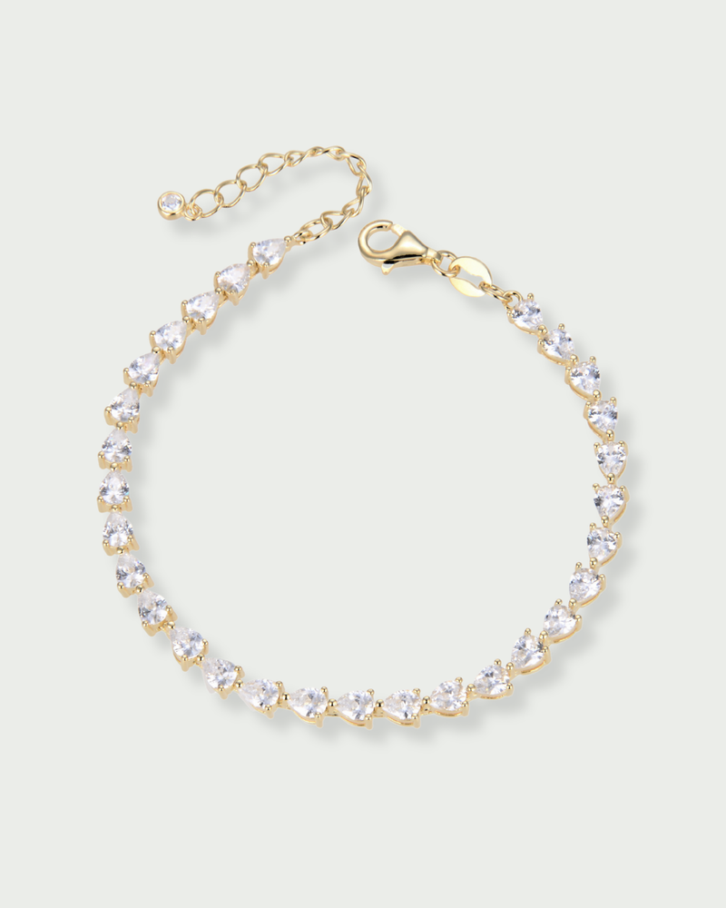 Bracelet Shine Éclat – Doré en argent 925 doré à l’or 18 carats, ligne délicate de pierres scintillantes, finition lumineuse résistante à l’oxydation, fermoir sécurisé, éclat solaire et élégant.
