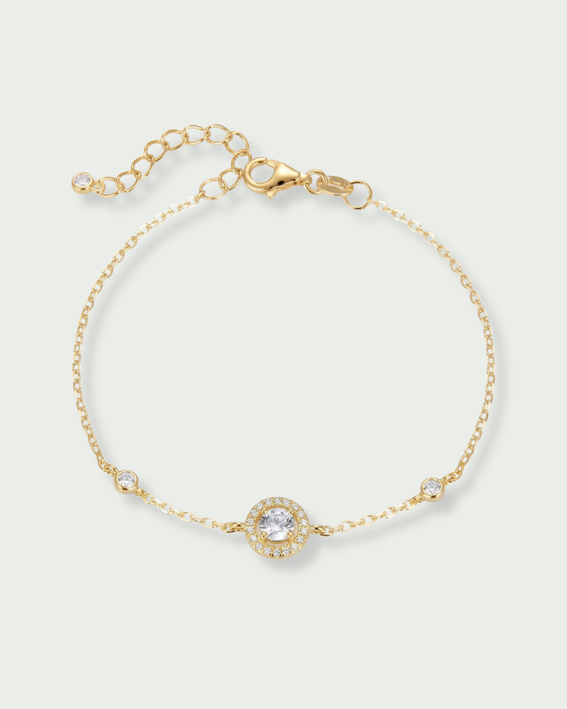 Bracelet rond pavé en argent 925 doré a l'or jaune 18k rhodié avec zirconium central et entourage pavé, chaîne ajustable.