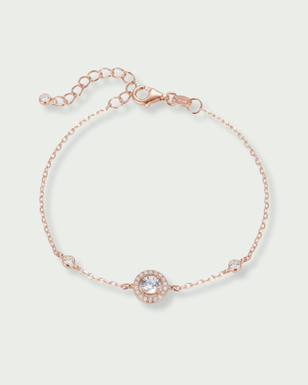 Bracelet rond pavé en argent 925 doré a l'or ROSE 18k rhodié avec zirconium central et entourage pavé, chaîne ajustable.