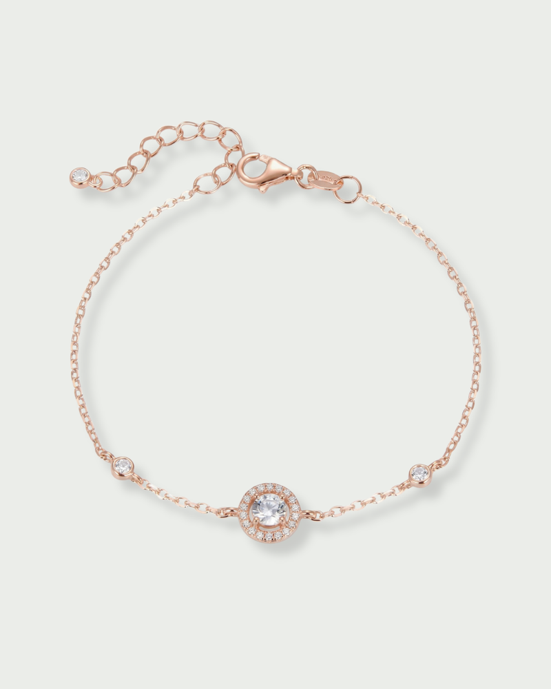 Bracelet rond pavé en argent 925 doré a l'or ROSE 18k rhodié avec zirconium central et entourage pavé, chaîne ajustable.