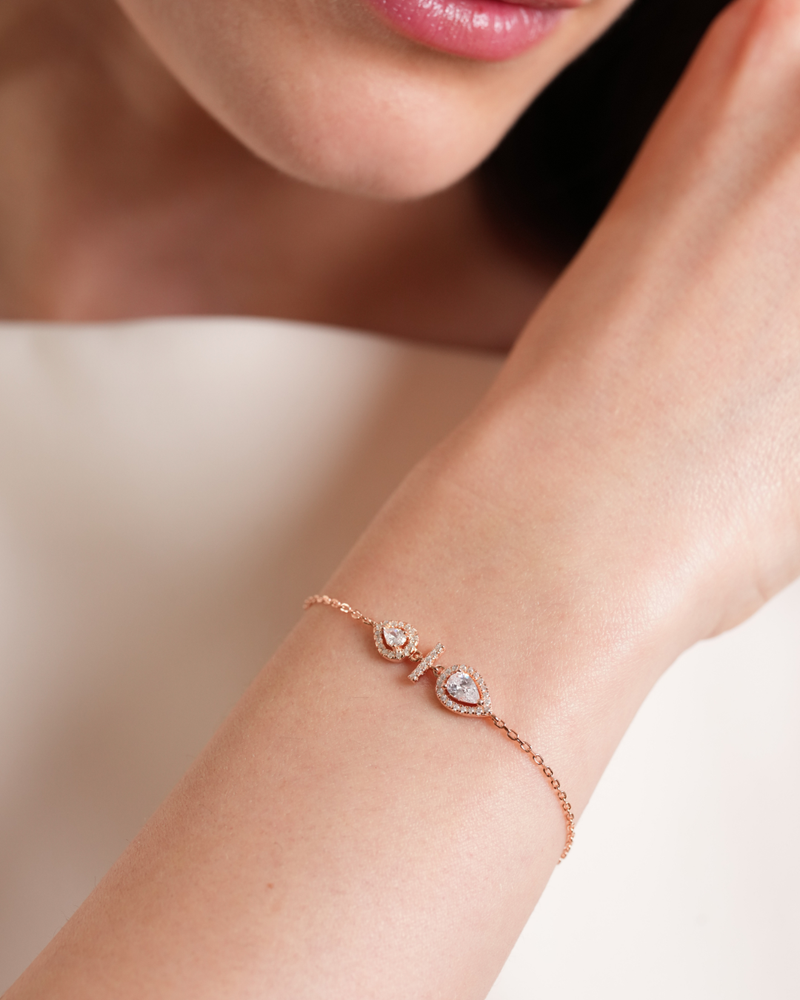 Bracelet  avec 2 poires en argent 925 doré à l'or 18 carats rose et Zirconiums