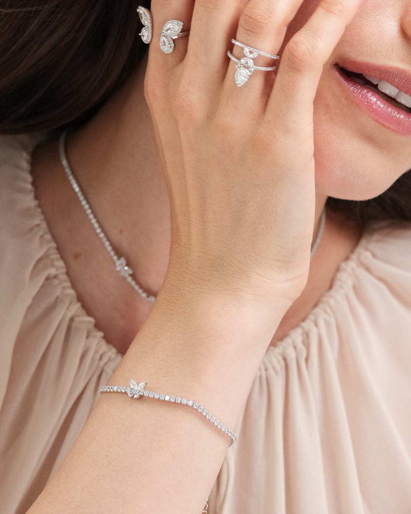 Bracelet rivière Papillon en argent 925 rhodié & Zirconium - porté avec d'autres bijoux Papillon blanc