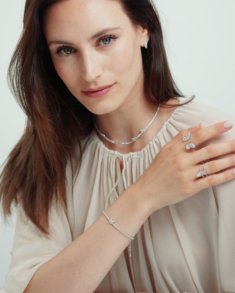 Bracelet rivière Papillon en argent 925 rhodié & Zirconium - porté avec d'autres bijoux Papillon blanc