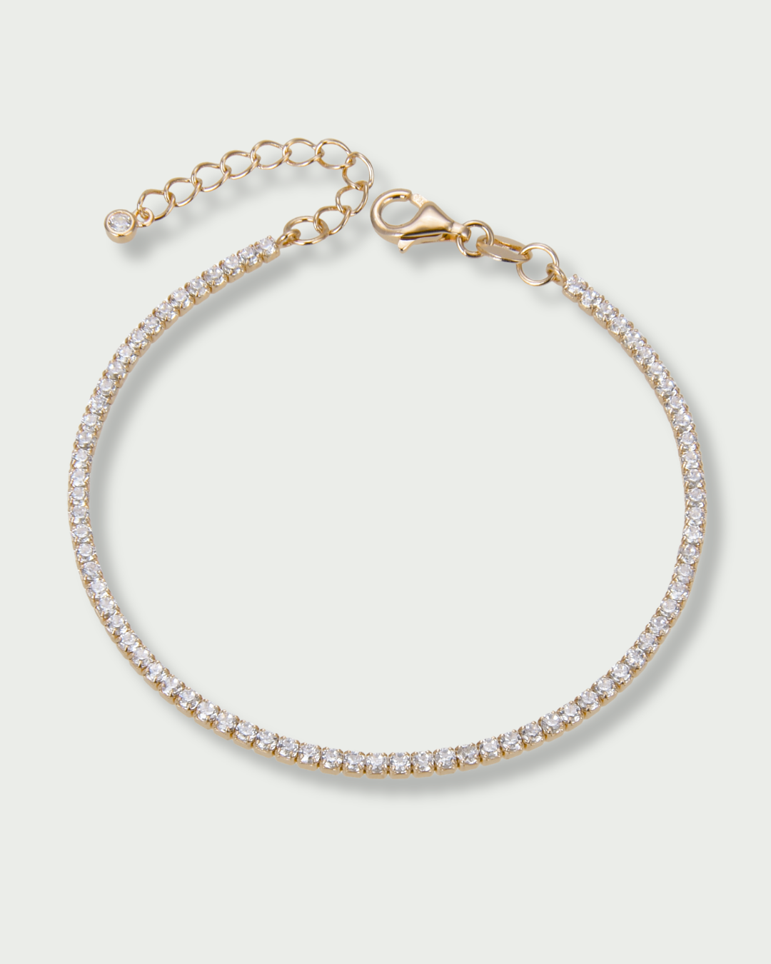 Bracelet Tennis Intemporel – DORÉ en argent 925 doré à l’or 18 carats, ligne de pierres finement serties, finition lumineuse résistante à l’oxydation, fermoir sécurisé, éclat doux et intemporel.
