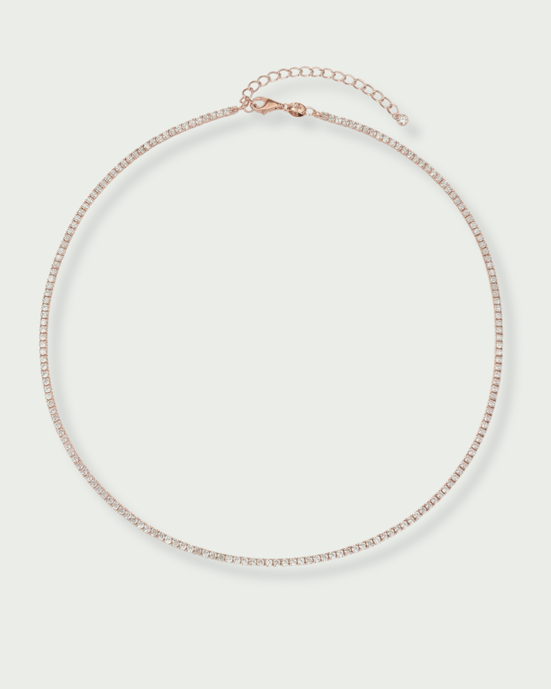  Choker Tennis Intemporel rose en argent 925 doré à l’or Rose 18 carats, collier ras‑du‑cou délicat avec zirconiums scintillants, design minimaliste et lumineux pour sublimer le cou avec élégance. 