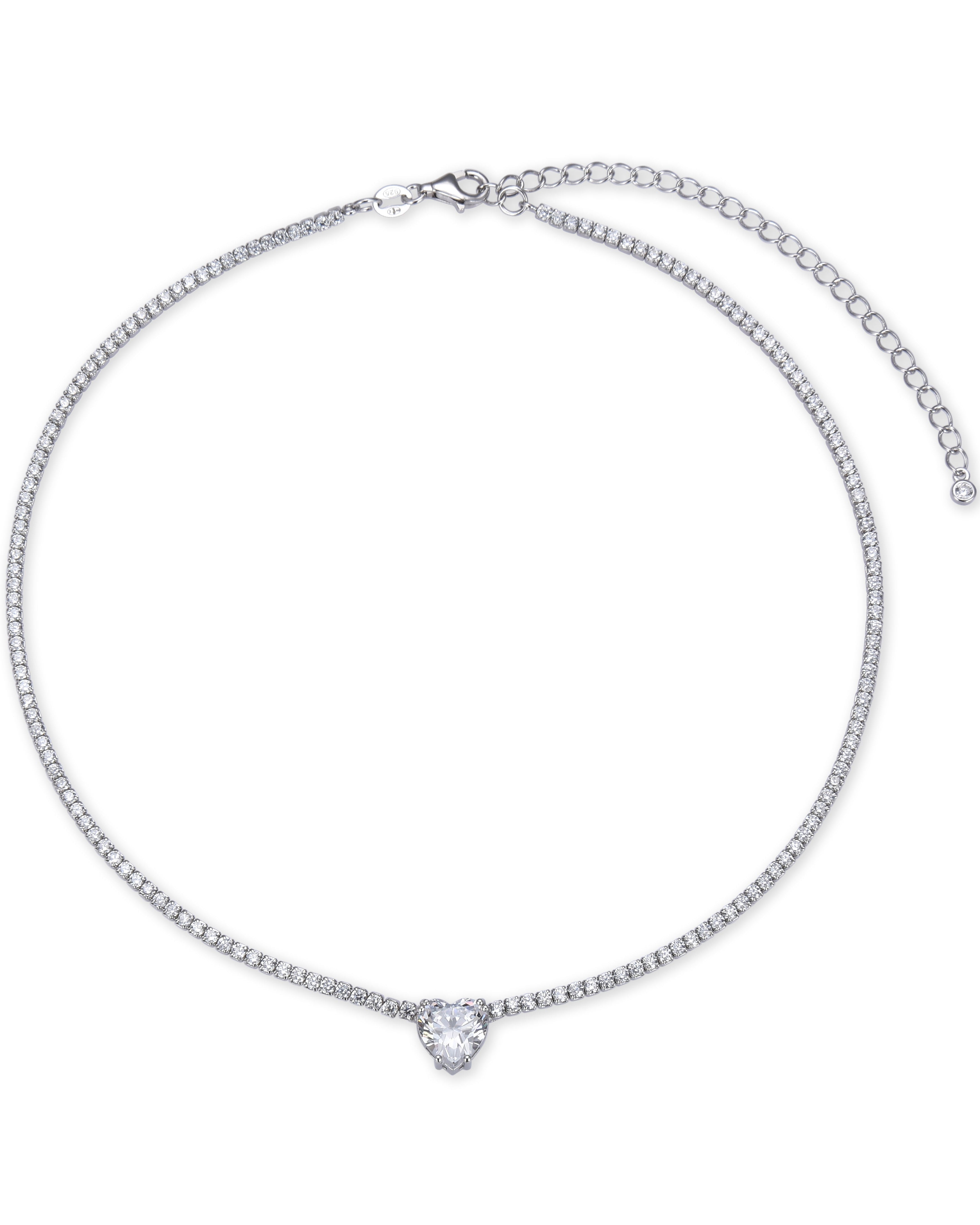 Choker « Tennis Cœur » en argent 925 rhodié, rangée continue de pierres blanches sublimée par un cœur de zirconium.