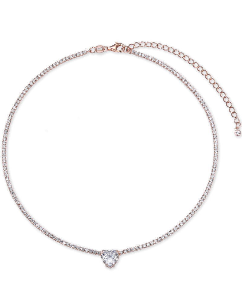 Choker « Tennis Cœur » en argent 925 doré à l'or 18 carats rose, rangée continue de pierres blanches sublimée par un cœur de zirconium.