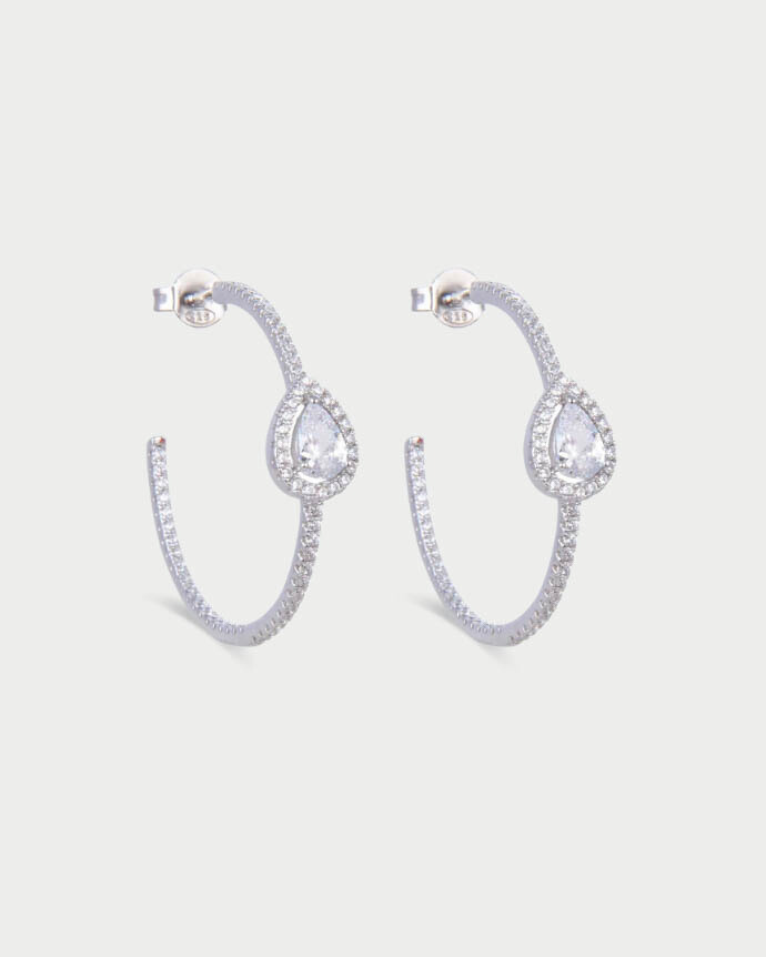 Boucles d’oreilles « Créoles Gala » en argent 925 rhodié, cercle stylisé orné d’un zirconium en forme de poire, finition polie brillante.