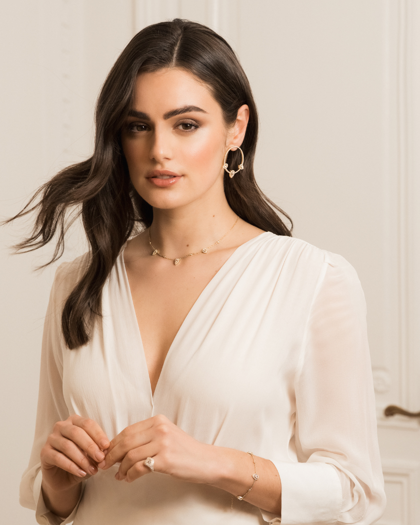 Paire de créoles Trio Infini Poire en argent 925 rhodié, ornées de trois pierres en zirconium blanc taille poire avec pavage scintillant, boucles d’oreilles élégantes et raffinées pour un look sophistiqué.