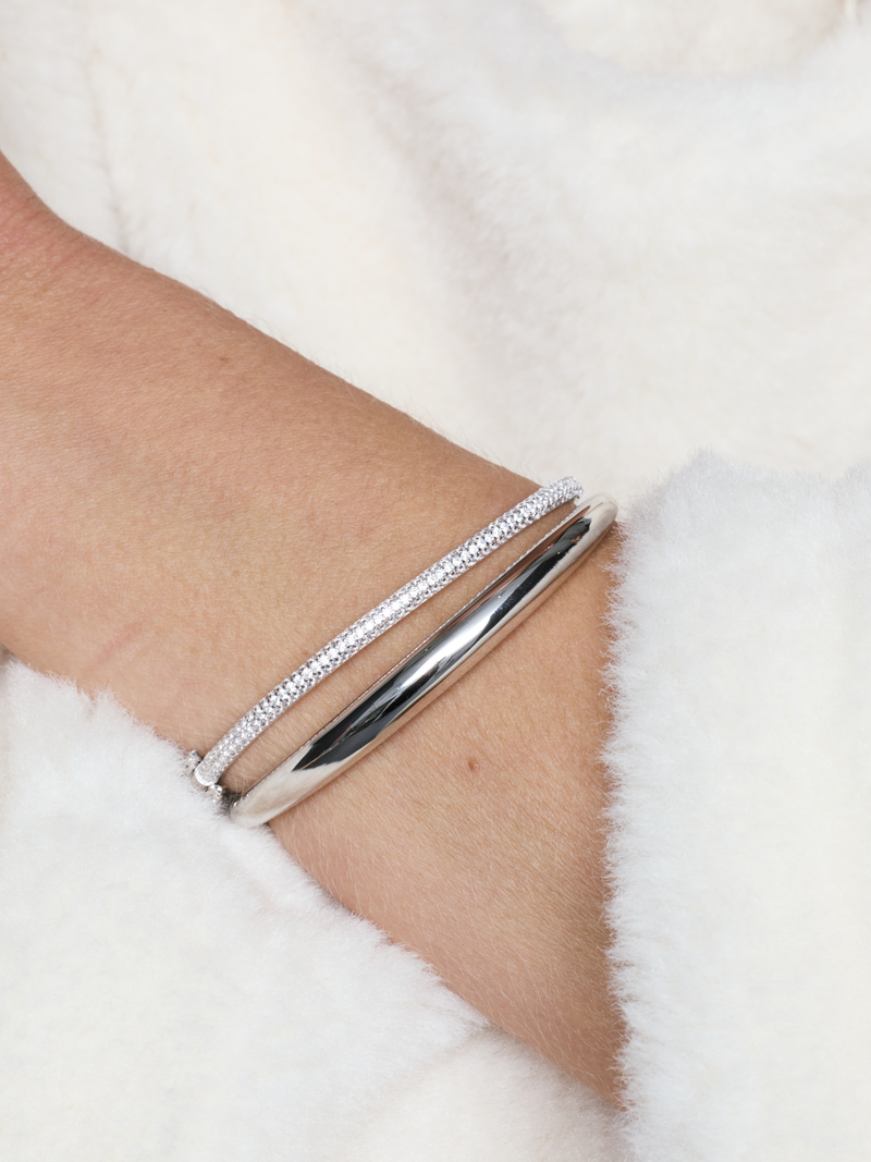 Jonc Shape blanc en argent 925 rhodié, design minimaliste et contemporain avec finition lisse et incurvée pour un style élégant et polyvalent.