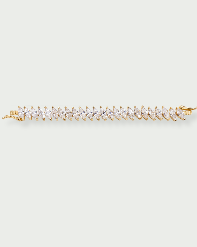 Bracelet semi-rigide en argent 925 doré orné d’une rivière de zircons blancs
