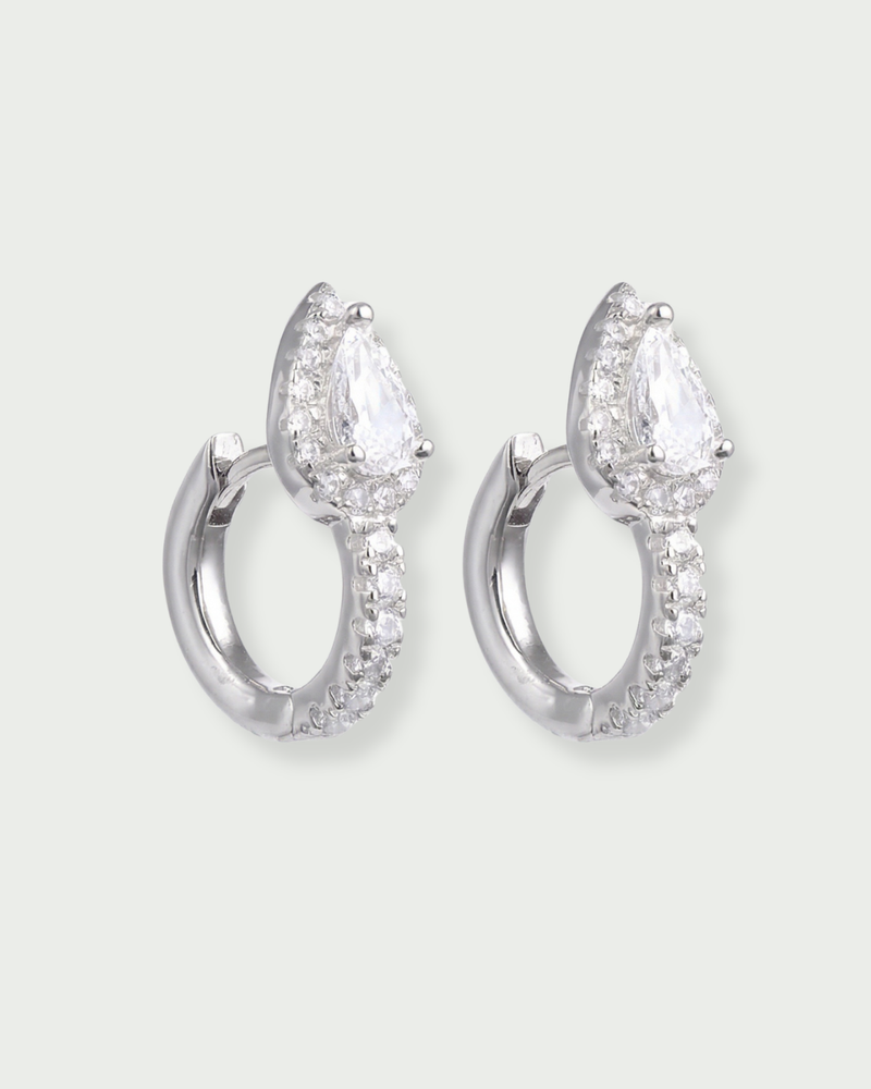Boucles d’oreilles puces « Mini Créoles Infini Poire » en argent 925, pendentif goutte‑poire élégant agrémenté d’un pavage de zirconiums taille ronde, finition polie brillante.