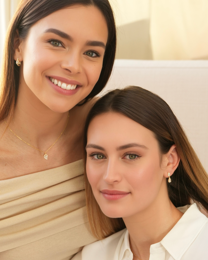 Boucles doubles poire en argent 925 doré avec zircon blanc pavé.