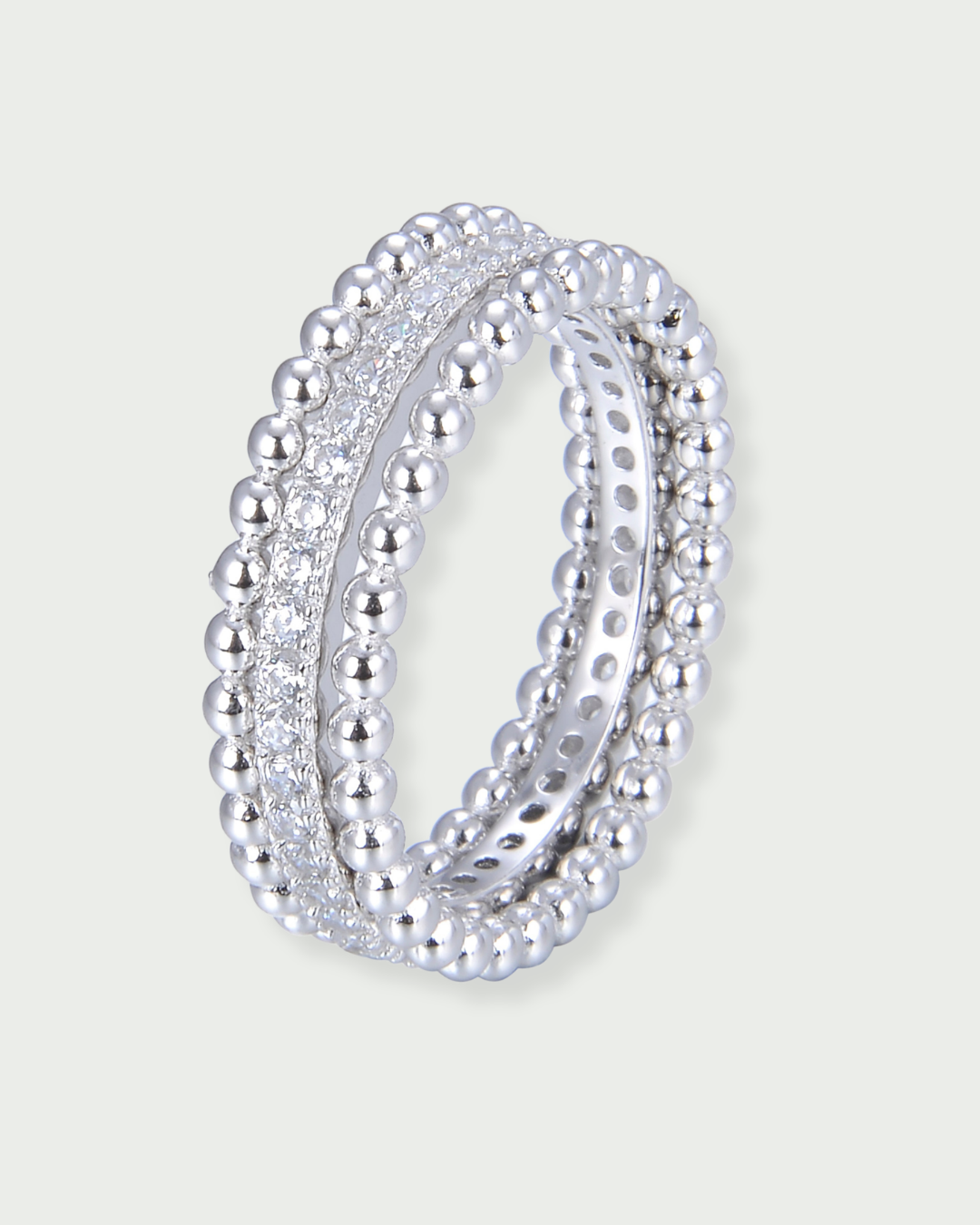 Bague « Trois Rangs Intemporel » en argent 925, design composé de trois anneaux parallèles 2 à boules lisses et 1 serti finition polie brillante.