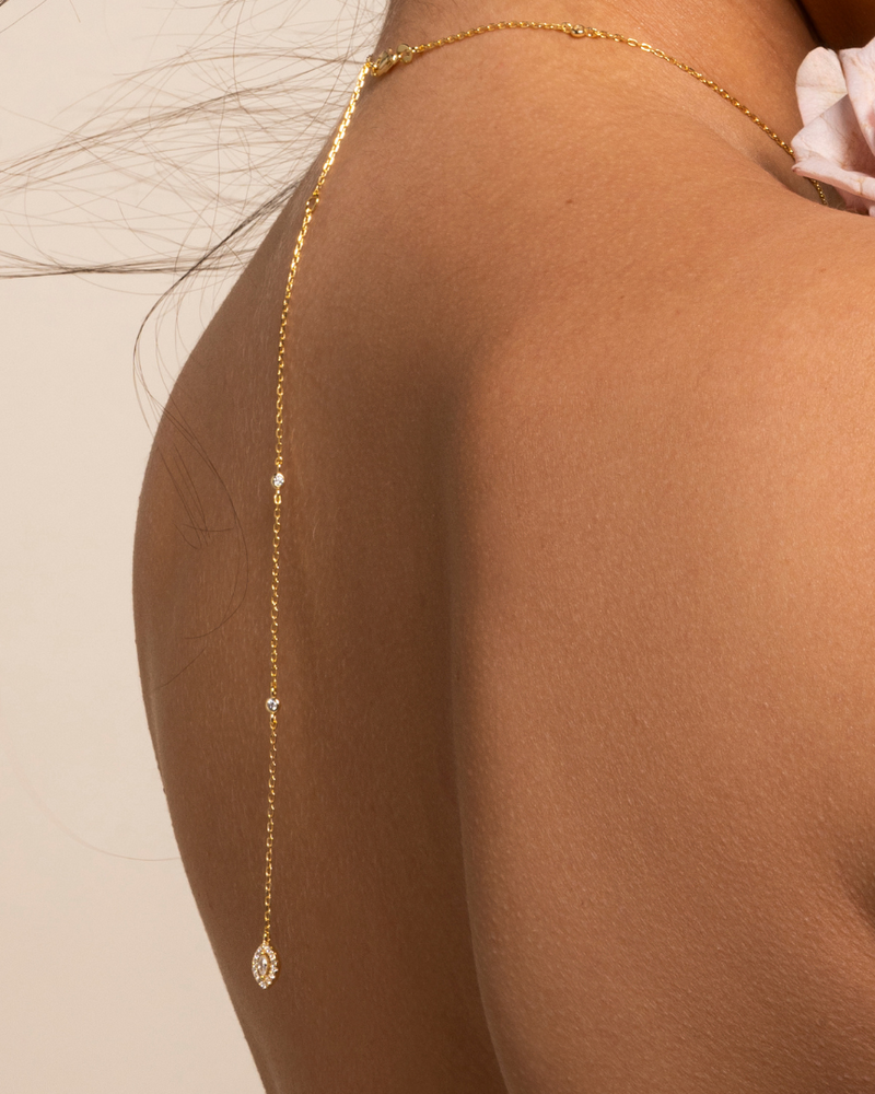 Choker « Dos Nu Fleur de Vie » en argent 925 rhodié, motif floral en zirconium taille marquise, chaîne choker 38 cm + chute dos 14 cm, finition polie brillante.