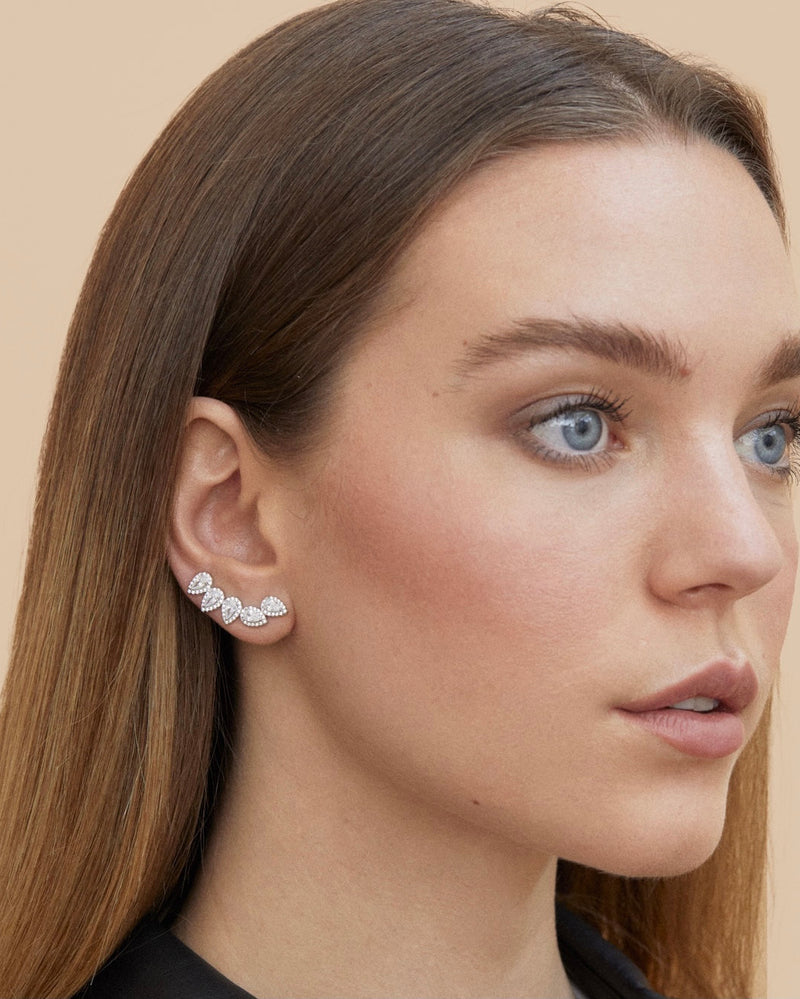 Boucles d’oreilles Cinq Poires Gala rose GENA Jewelry en argent 925 doré à l’or rose, ornées de cinq zircons taille poire entourés d’un pavage lumineux.