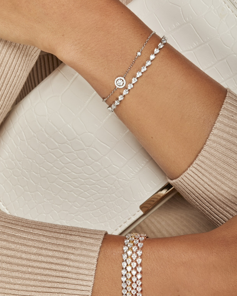 Bracelet rond pavé en argent 925 rhodié avec zirconium central et entourage pavé, chaîne ajustable.