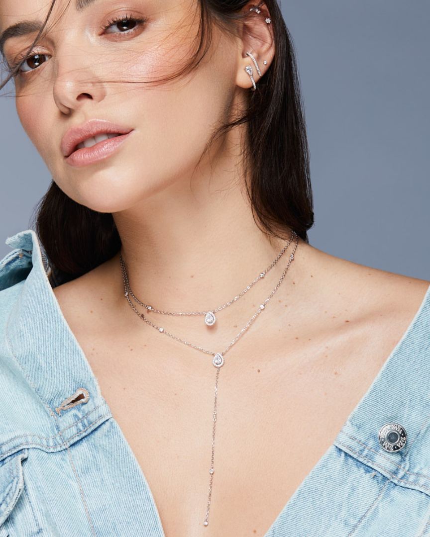 Sautoir « Double Infini Poire » en argent 925 doré à l’or jaune 18 carats, double rang dont un choker orné de pierres en zirconium taille poire, finition polie brillante.